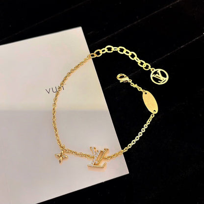 「Lume Jewelry」ロゴ スターモチーフ ゴールドブレスレット