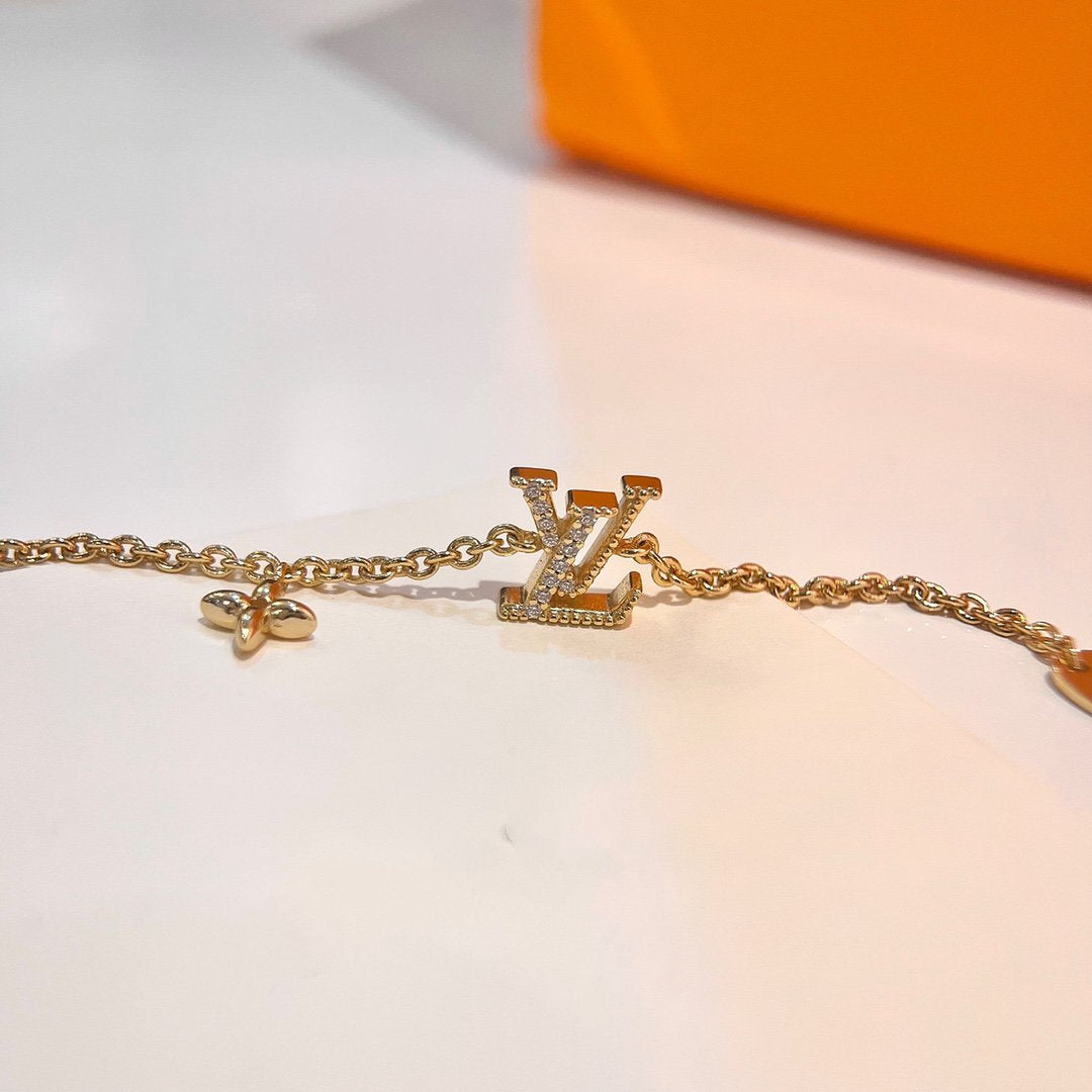 「Lume Jewelry」ロゴ スターモチーフ ゴールドブレスレット