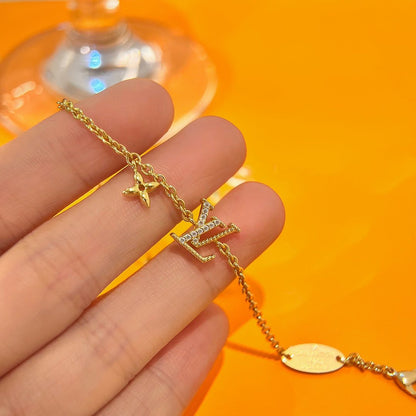「Lume Jewelry」ロゴ スターモチーフ ゴールドブレスレット