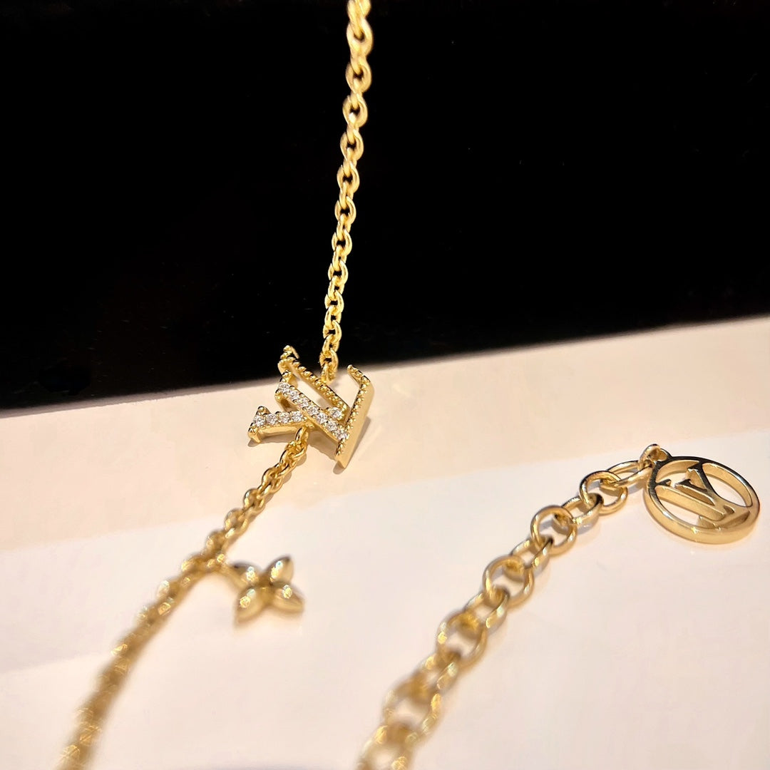 「Lume Jewelry」ロゴ スターモチーフ ゴールドブレスレット