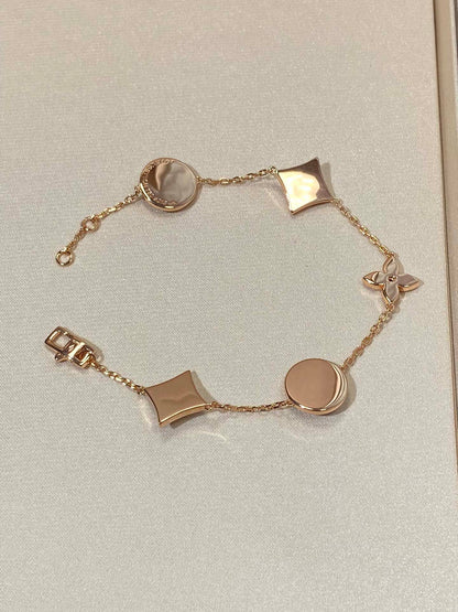 Lume Jewelry「STAR AND SUN 5モチーフMOPピンクゴールドブレスレット」