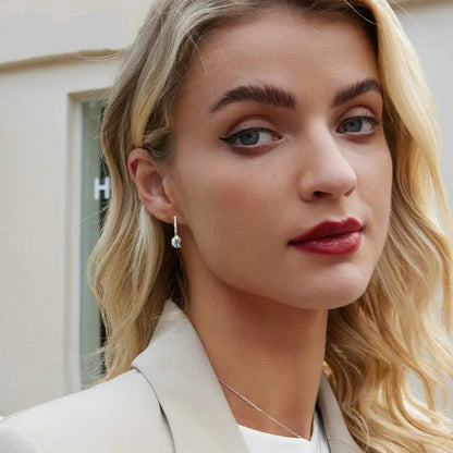 青い巻貝の耳飾り ドロップ型低刺激性ピアス